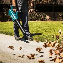 Makita XT287SM1 18V LXT Li-Ion Brushless Cordless Trimmer/Blower Combo Kit Tools & Equipment